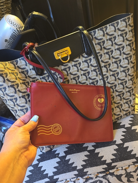 Salvatore Ferragamo Handbags - Salvatore Ferragamo Red Leather Wristlet Pouch with Black Strap and Gold Accents